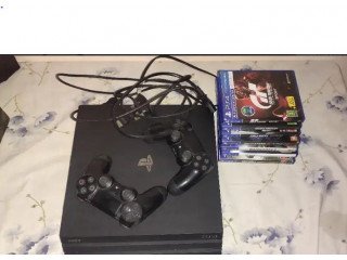 PS4 PRO 1 TB(Jet Black) With Games and Extra remote!