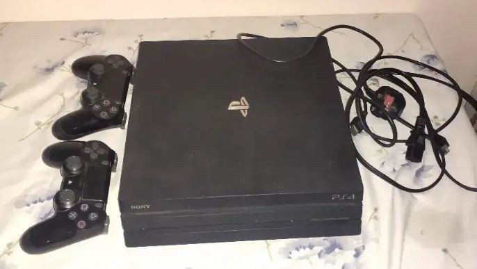 ps4-pro-1-tbjet-black-with-games-and-extra-remote-big-1