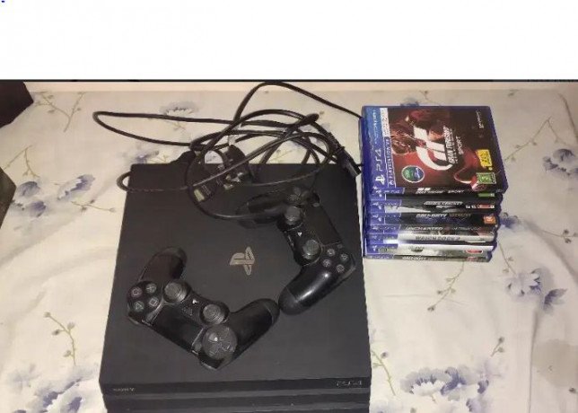 ps4-pro-1-tbjet-black-with-games-and-extra-remote-big-0