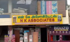 at-avadi-job-shop-assistant-sells-products-to-customers-in-a-shop-big-0